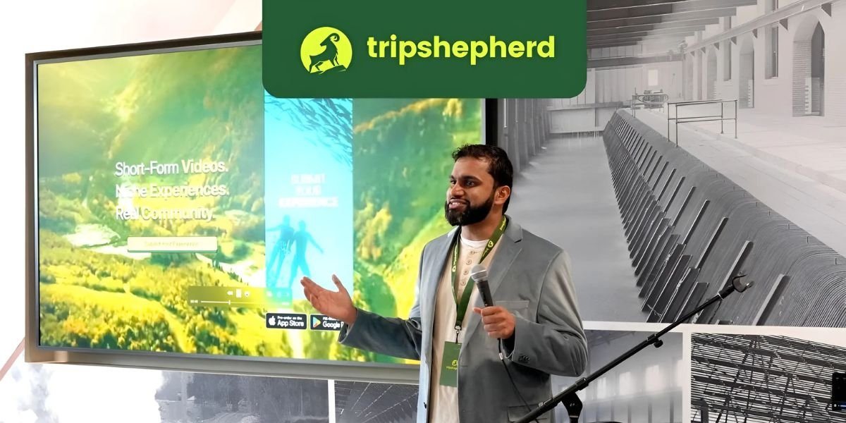 Daud Grewal presenting on stage at the Tripshepherd launch in Niagara Falls